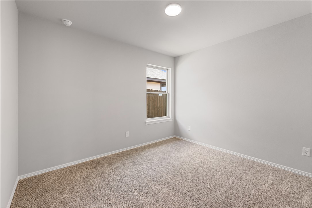 2869 Messenger Way Bryan, TX 77803 - Photo 21 of 23 a view of an empty room with a window