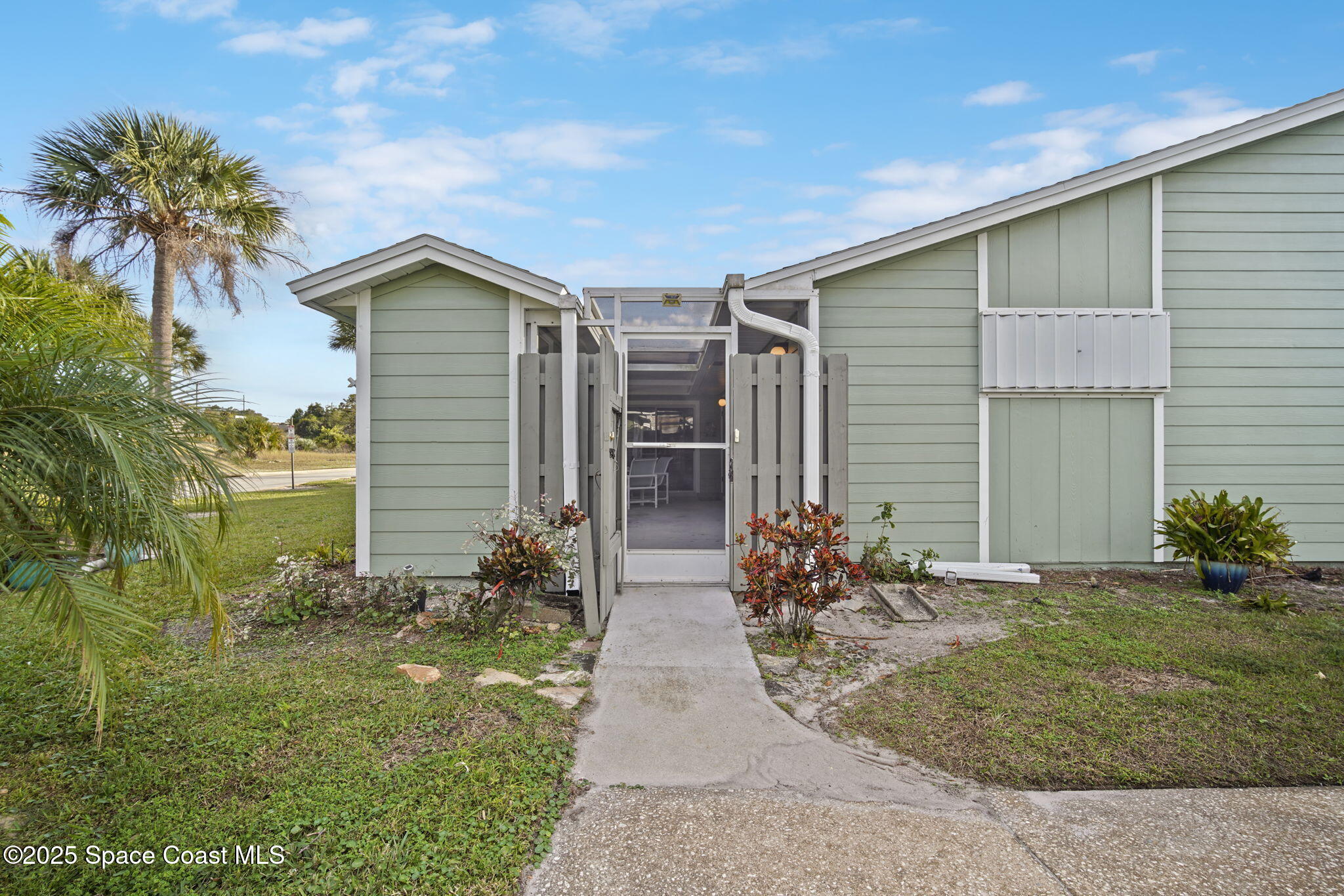 1956 Quail Ridge Court, Unit 1802 Cocoa, FL 32926 - Photo 1 of 42 3-web-or-mls-QUAIL_FRONT5