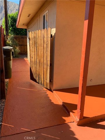 a view of a pathway both side of yard