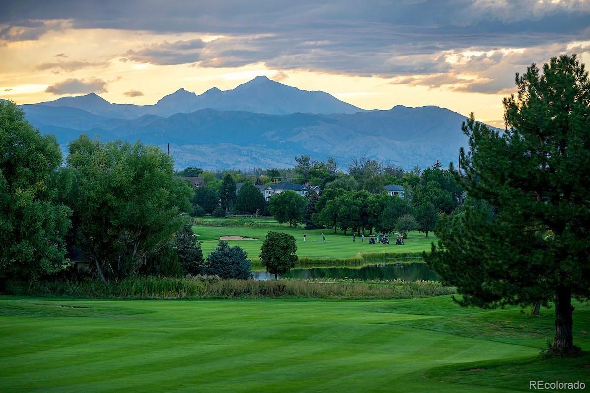 768 Bridger Point Lafayette, CO 80026 - Photo 1 of 50 a view of a grassy field with mountains in the background