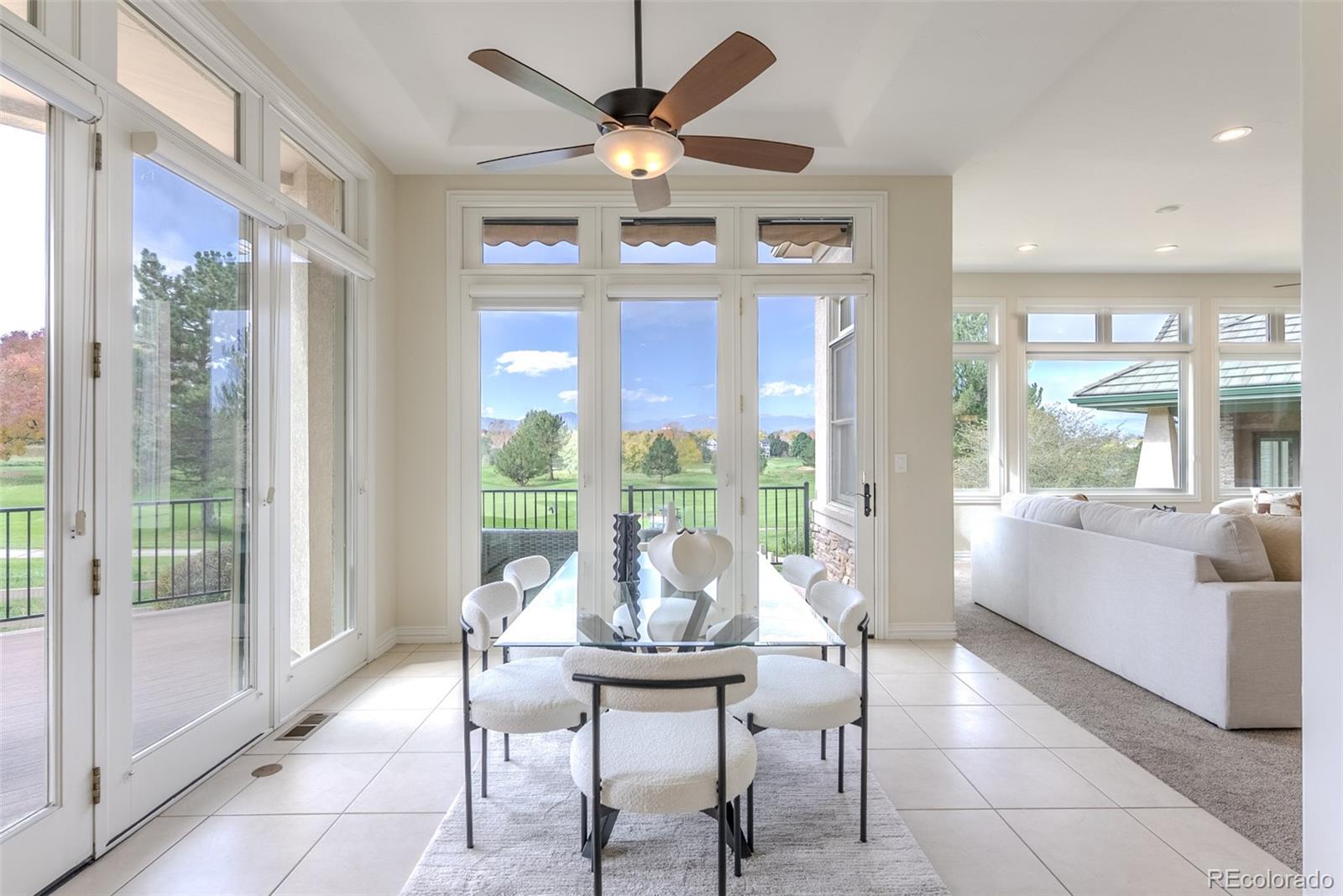768 Bridger Point Lafayette, CO 80026 - Photo 14 of 50 a view of a dining room with furniture window and outside view