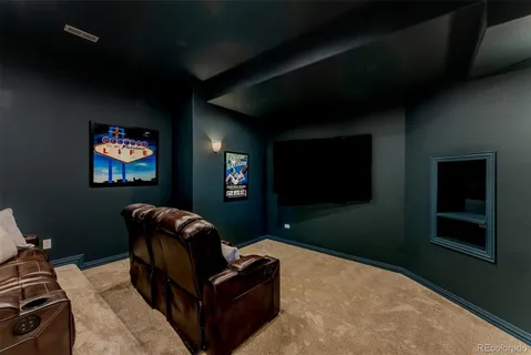 a view of an empty room with windows