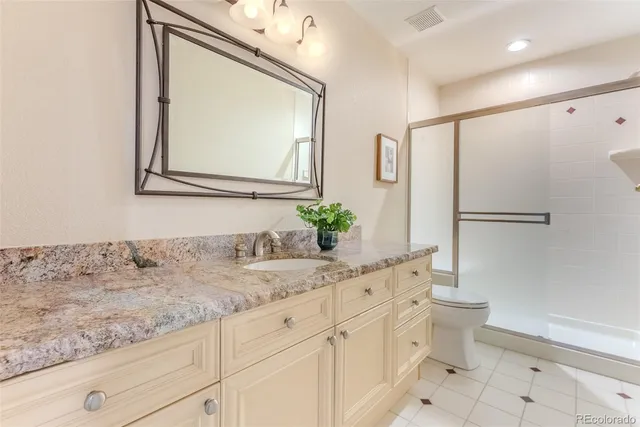 a bathroom with a tub and shower