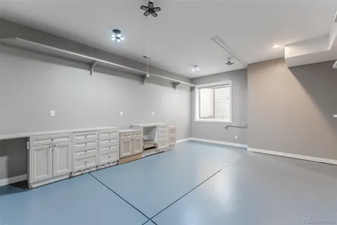 a utility room with sink dryer and washer