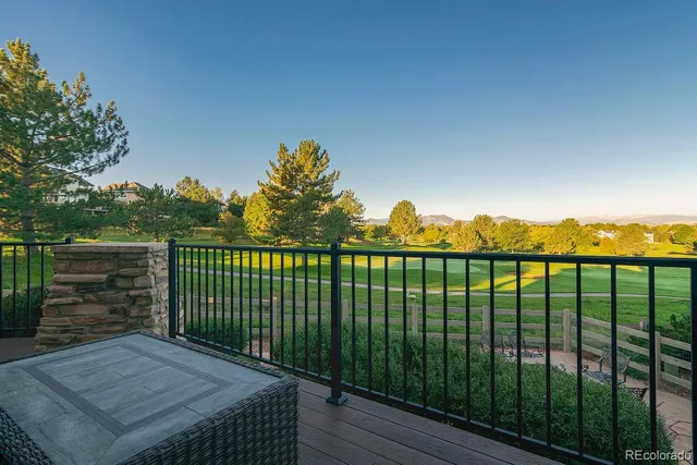 swimming pool view with a seating space
