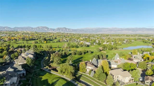 a view of a city with a lake