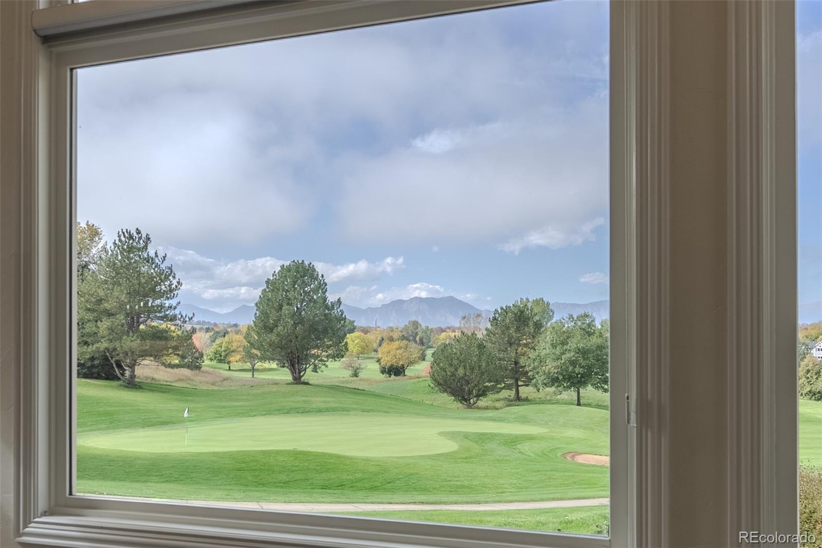 768 Bridger Point Lafayette, CO 80026 - Photo 6 of 50 a view of a yard from a window