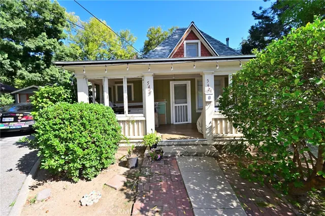 front view of a house with a small yard