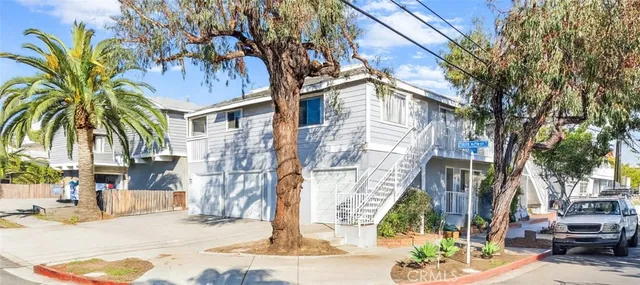 a view of a brick building with many windows