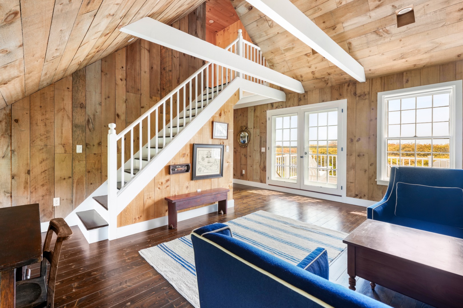 21 Quidnet Road Nantucket, MA 02554 - Photo 27 of 62 a living room with furniture and a window