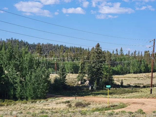 a view of a water with a yard