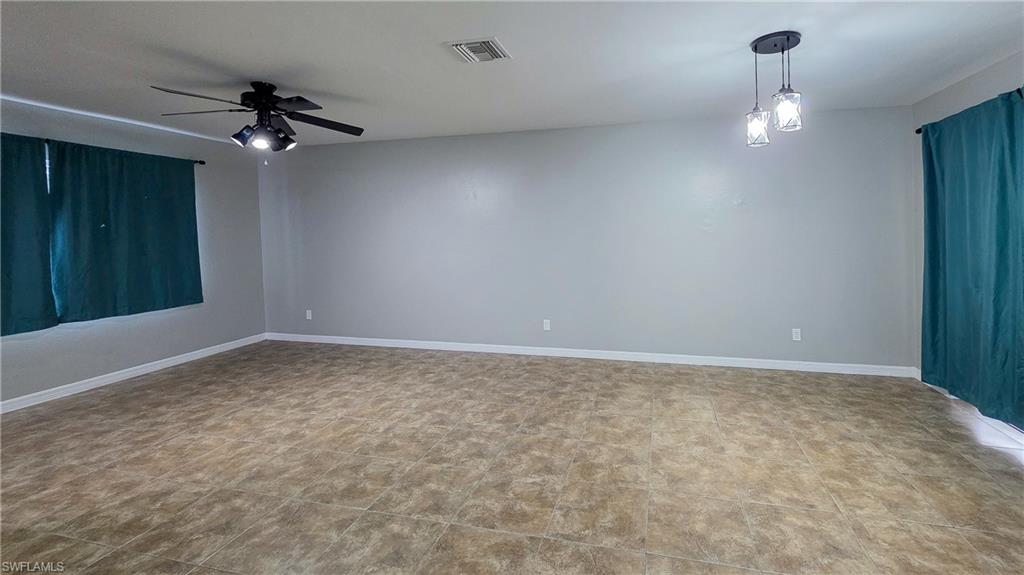 7319 Albany Road Fort Myers, FL 33967 - Photo 8 of 27 a view of a room with a ceiling fan
