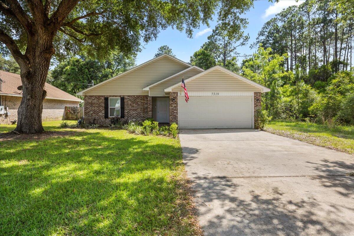 7319 Gordon Evans Road Navarre, FL 32566 - Photo 1 of 23 IMG_1084