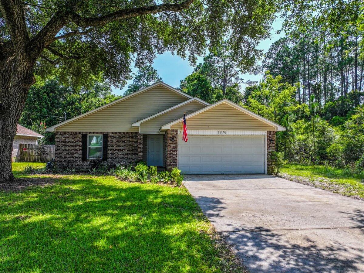 7319 Gordon Evans Road Navarre, FL 32566 - Photo 2 of 23 IMG_1093