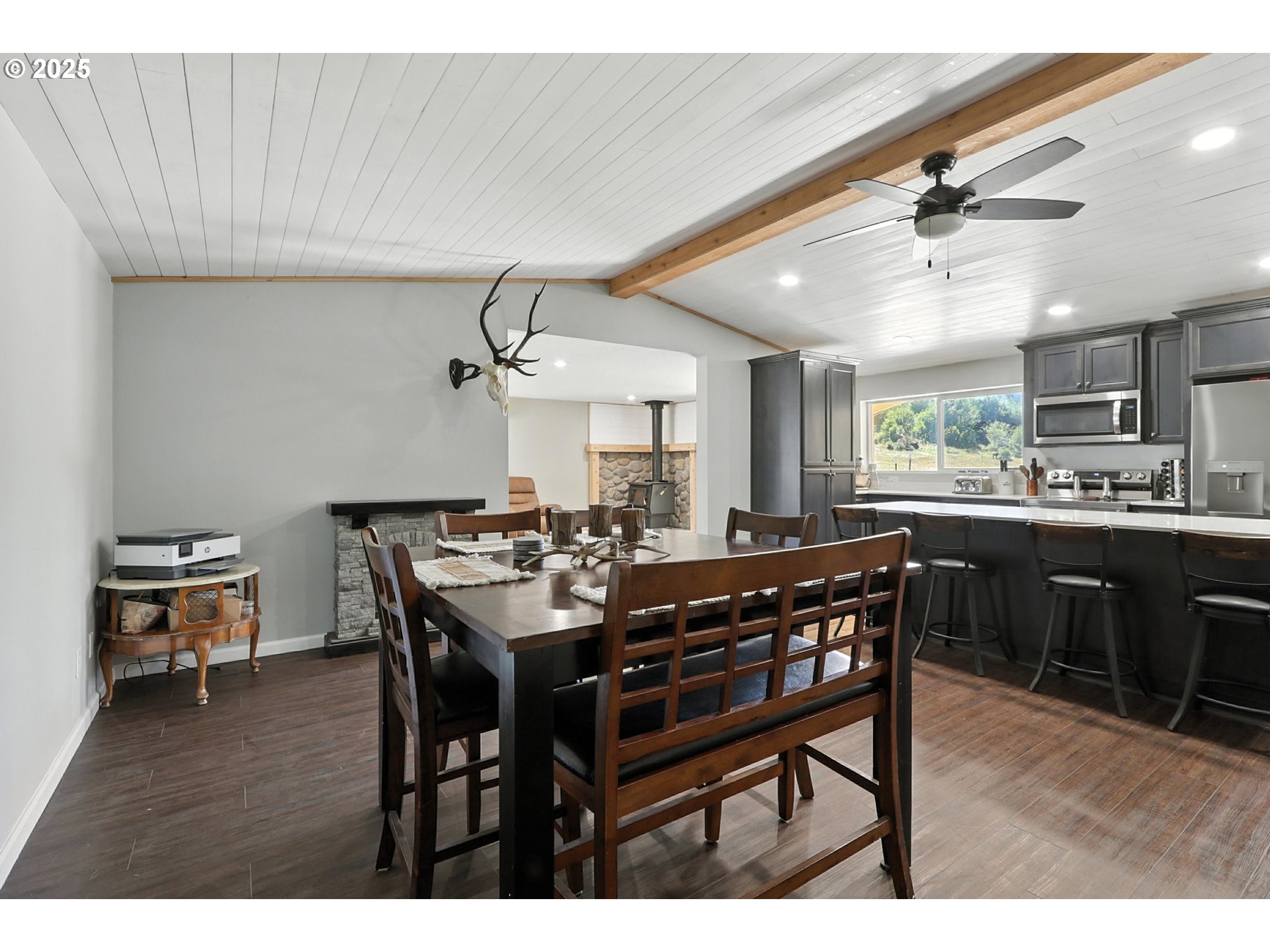 22404 Northeast Dole Valley Road Yacolt, WA 98675 - Photo 13 of 45 a view of a dining room with furniture and a chandelier