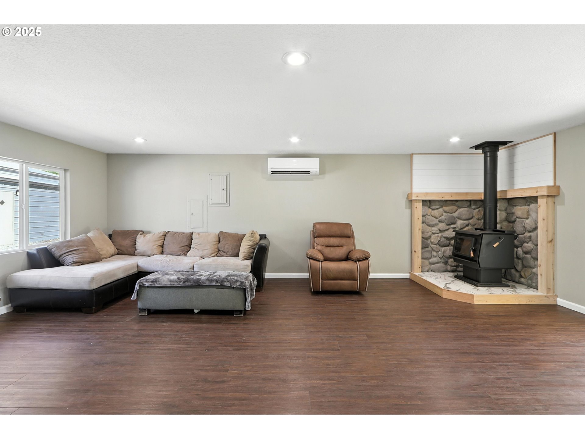 22404 Northeast Dole Valley Road Yacolt, WA 98675 - Photo 21 of 45 a living room with furniture and a fireplace