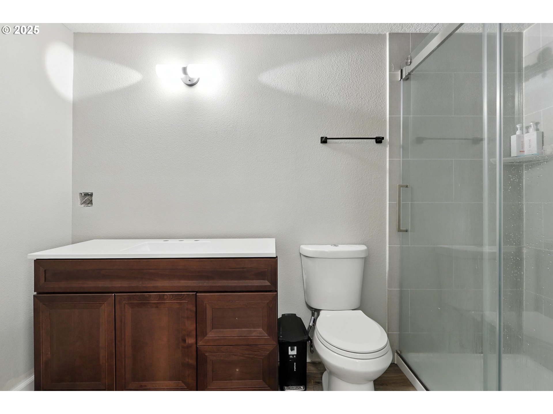 22404 Northeast Dole Valley Road Yacolt, WA 98675 - Photo 28 of 45 a bathroom with a toilet a sink and shower