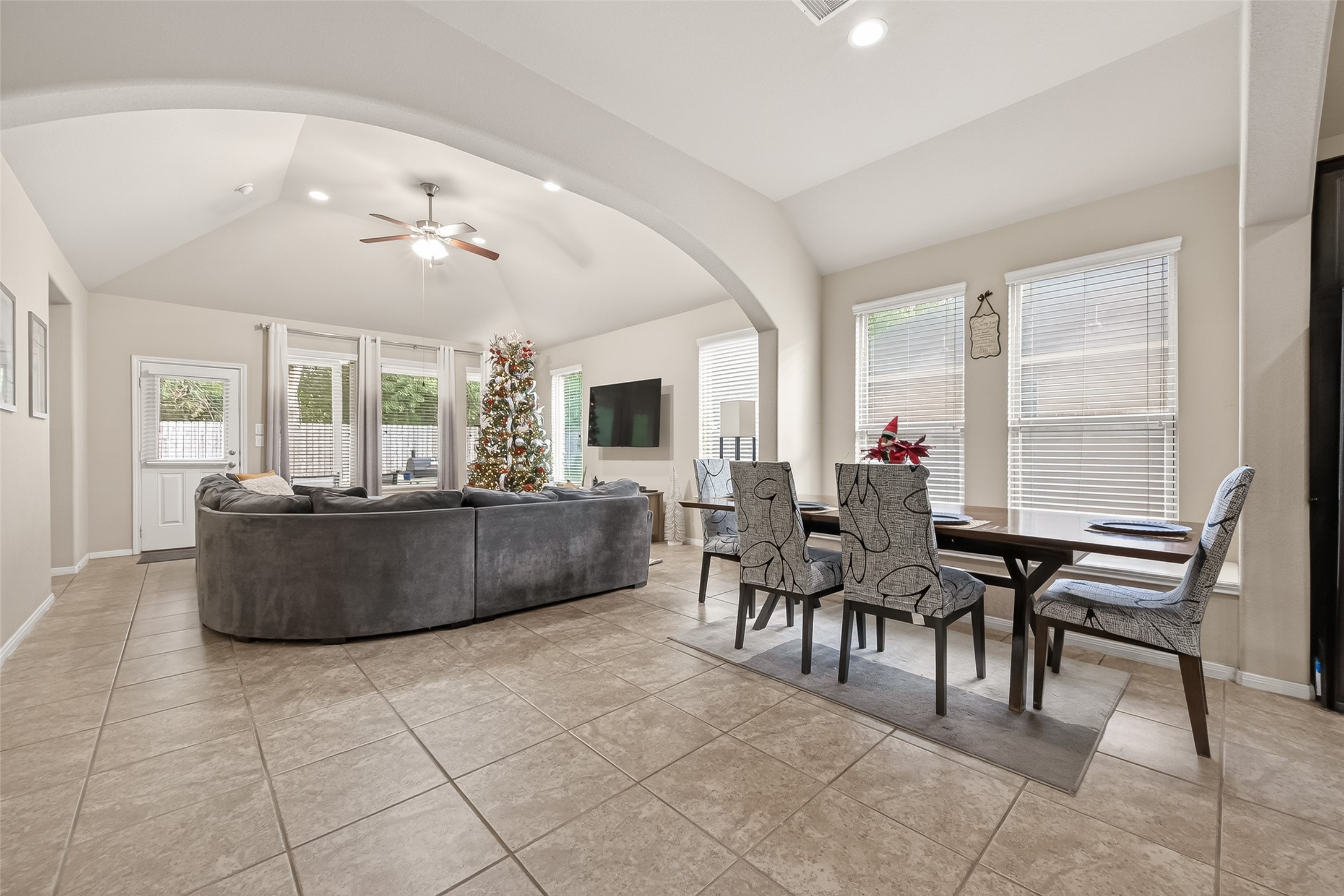 22530 Forbes Field Trail Spring, TX 77389 - Photo 11 of 50 a living room with furniture and a dining table with kitchen view