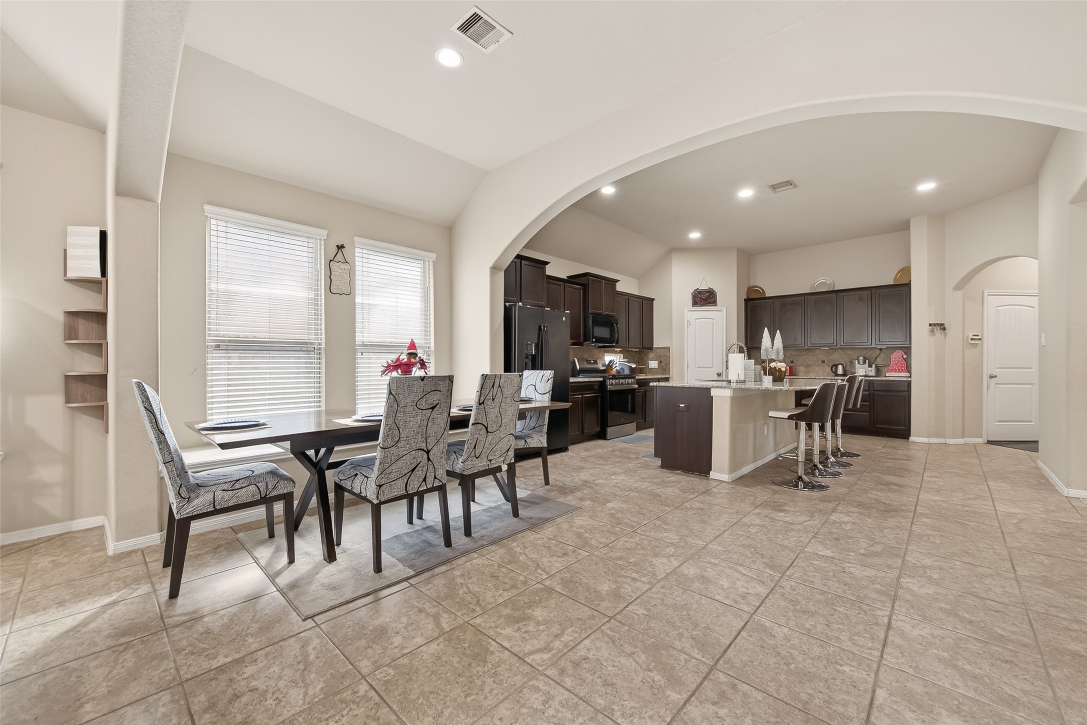 22530 Forbes Field Trail Spring, TX 77389 - Photo 12 of 50 a view of a dining room with furniture