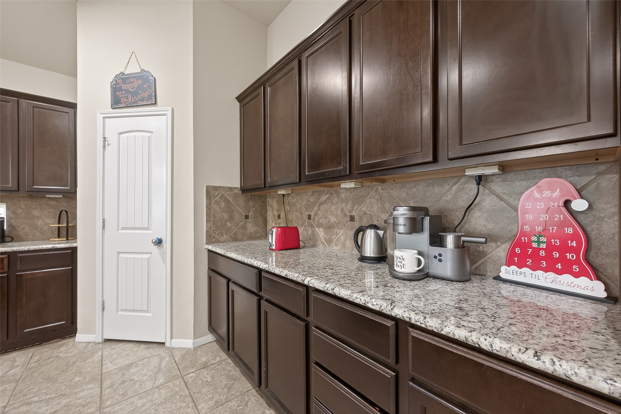 22530 Forbes Field Trail Spring, TX 77389 - Photo 16 of 50 a kitchen with granite countertop stainless steel appliances white cabinets and refrigerator
