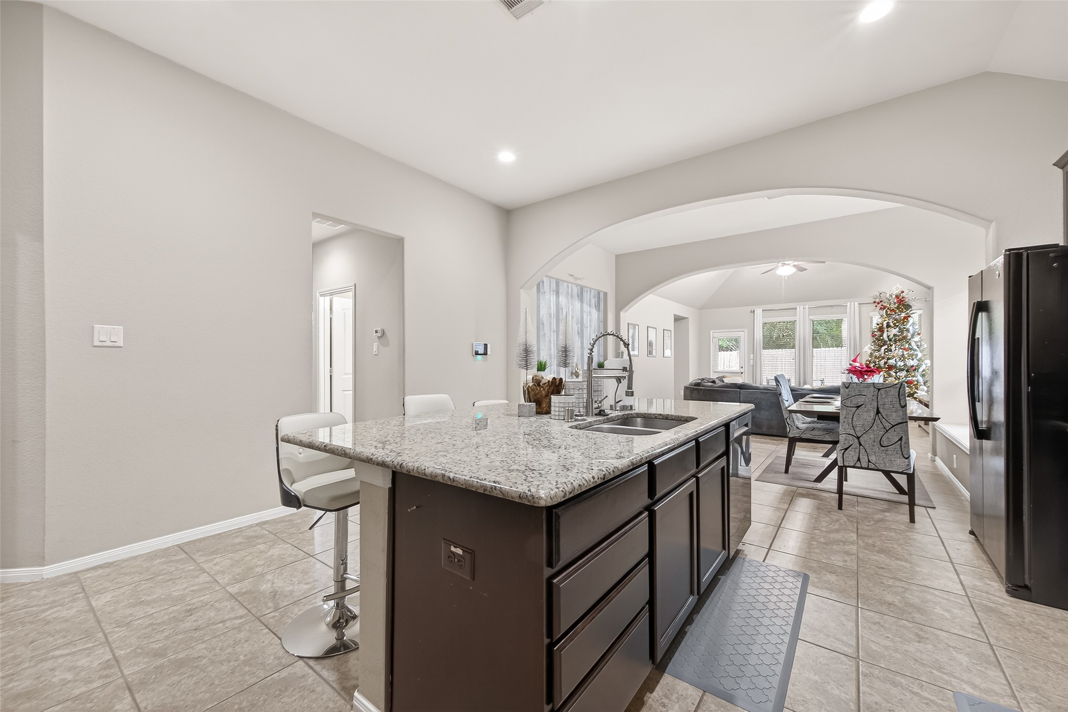 22530 Forbes Field Trail Spring, TX 77389 - Photo 19 of 50 a dining hall with stainless steel appliances granite countertop a sink and a refrigerator