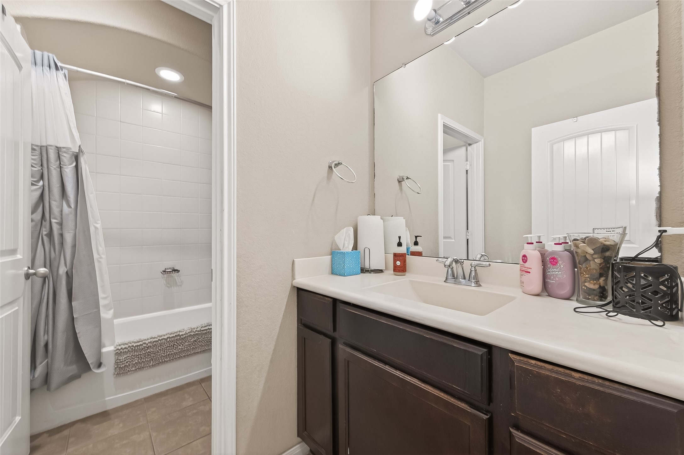 22530 Forbes Field Trail Spring, TX 77389 - Photo 29 of 50 a bathroom with a double vanity sink a mirror and a shower