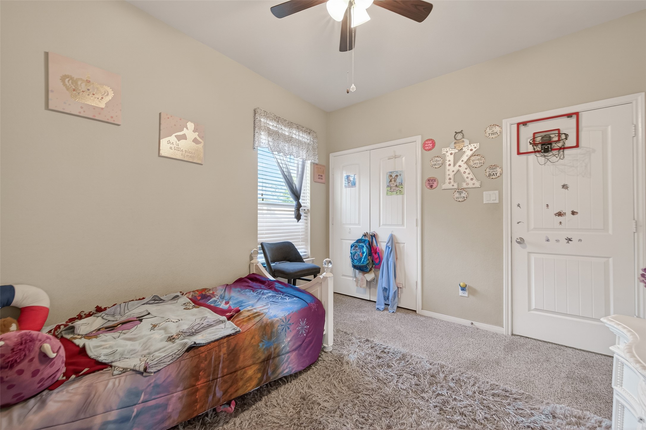 22530 Forbes Field Trail Spring, TX 77389 - Photo 33 of 50 a bedroom with a bed and a chandelier