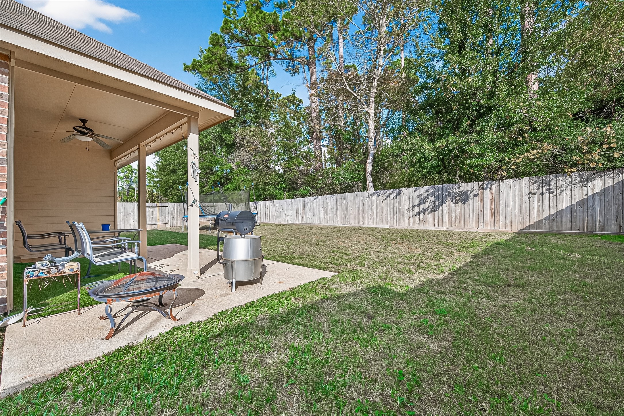 22530 Forbes Field Trail Spring, TX 77389 - Photo 35 of 50 a view of a backyard with sitting area and garden