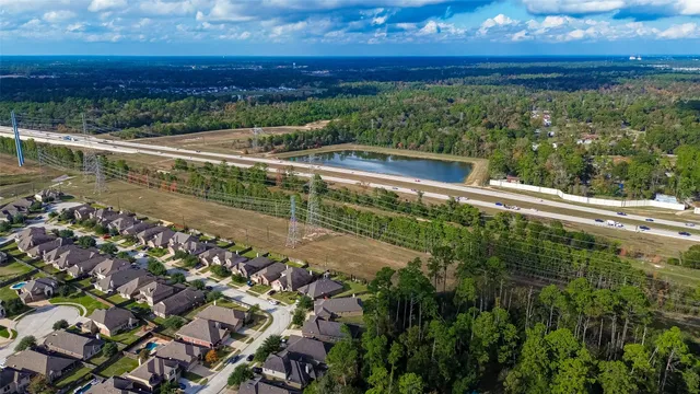 a view of a lake with a yard