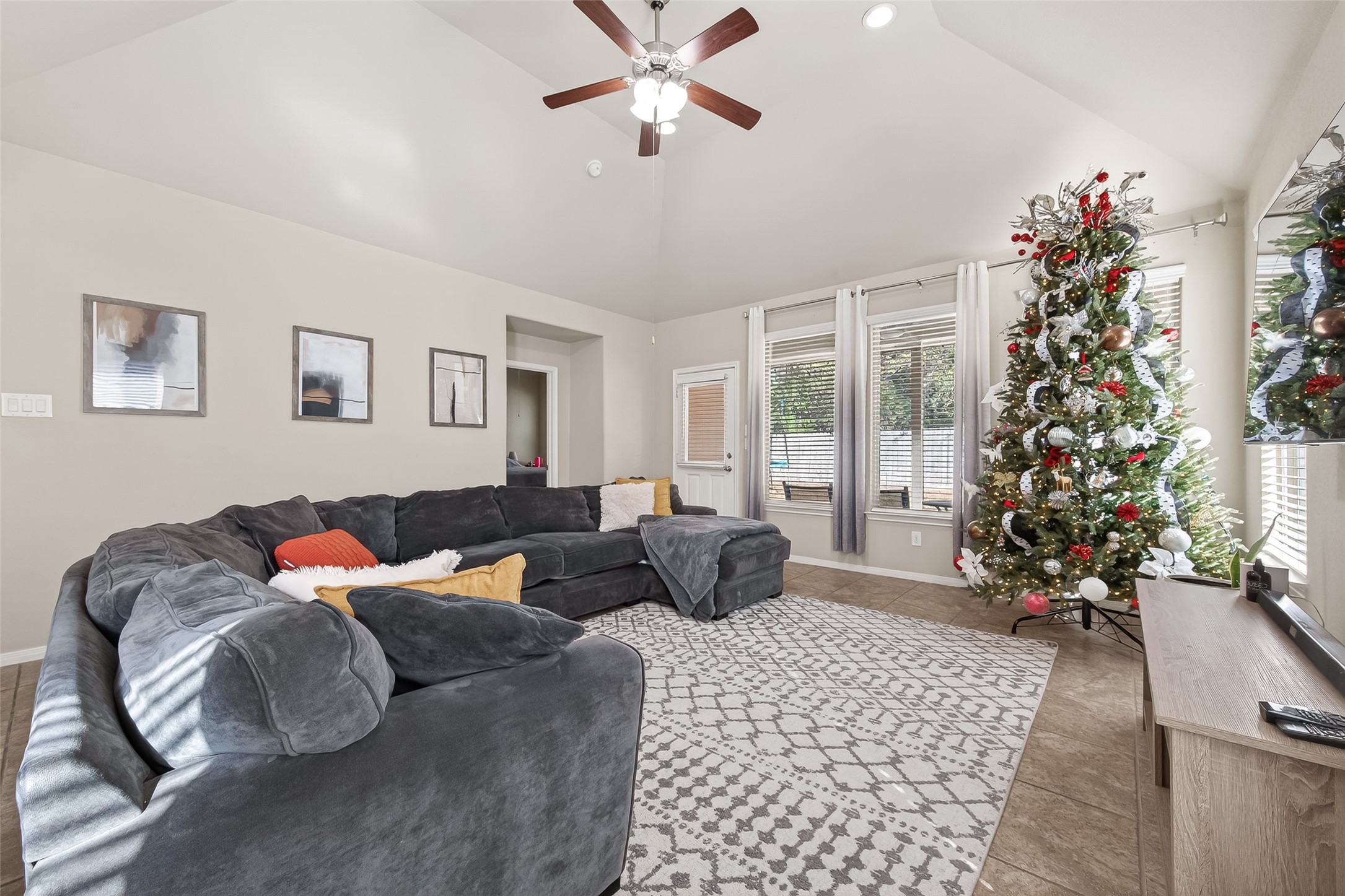 22530 Forbes Field Trail Spring, TX 77389 - Photo 6 of 50 a living room with furniture flowers and a chandelier