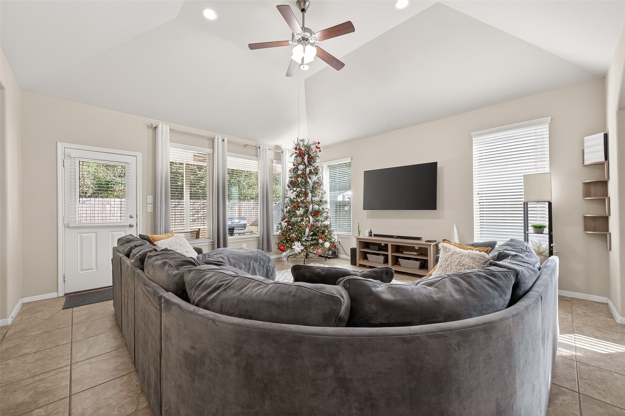 22530 Forbes Field Trail Spring, TX 77389 - Photo 7 of 50 a living room with furniture and a flat screen tv