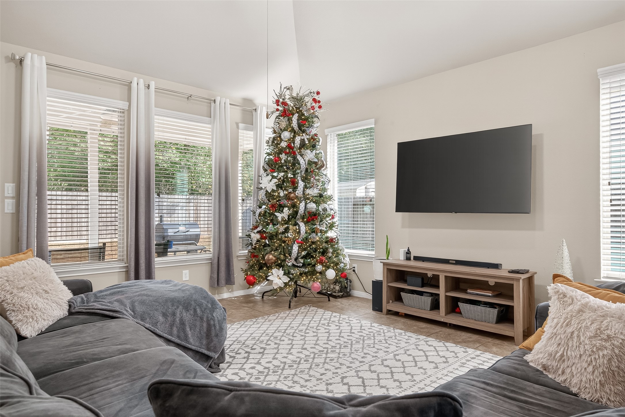 22530 Forbes Field Trail Spring, TX 77389 - Photo 8 of 50 a living room with furniture and a flat screen tv
