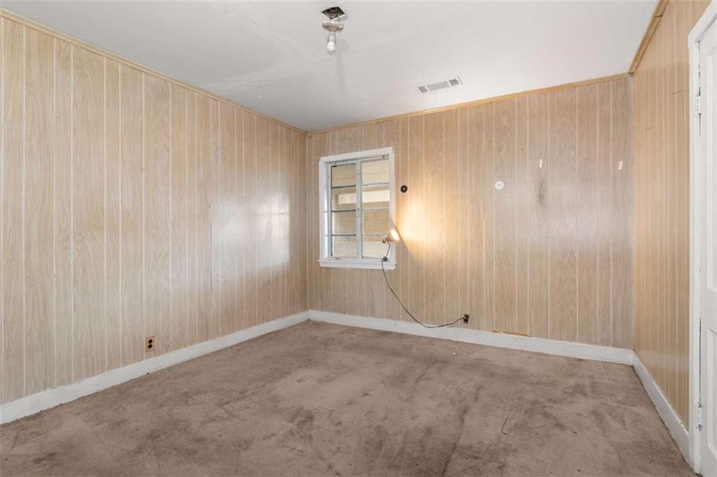 1638 Burton Avenue Macon, GA 31204 - Photo 13 of 15 a view of an empty room with a window