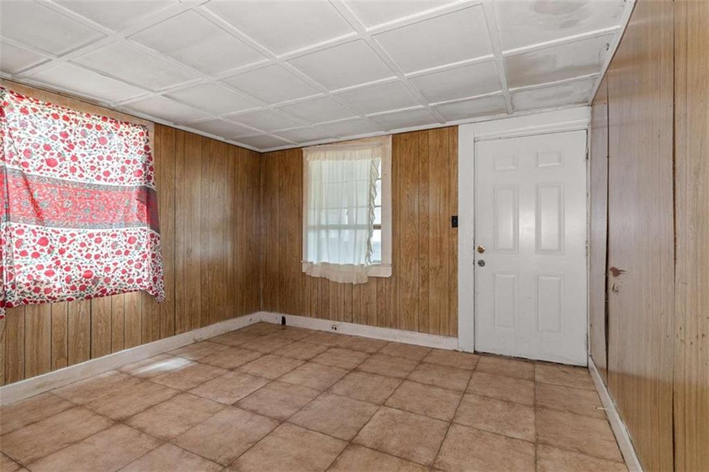1638 Burton Avenue Macon, GA 31204 - Photo 14 of 15 a view of an empty room with window and cabinet
