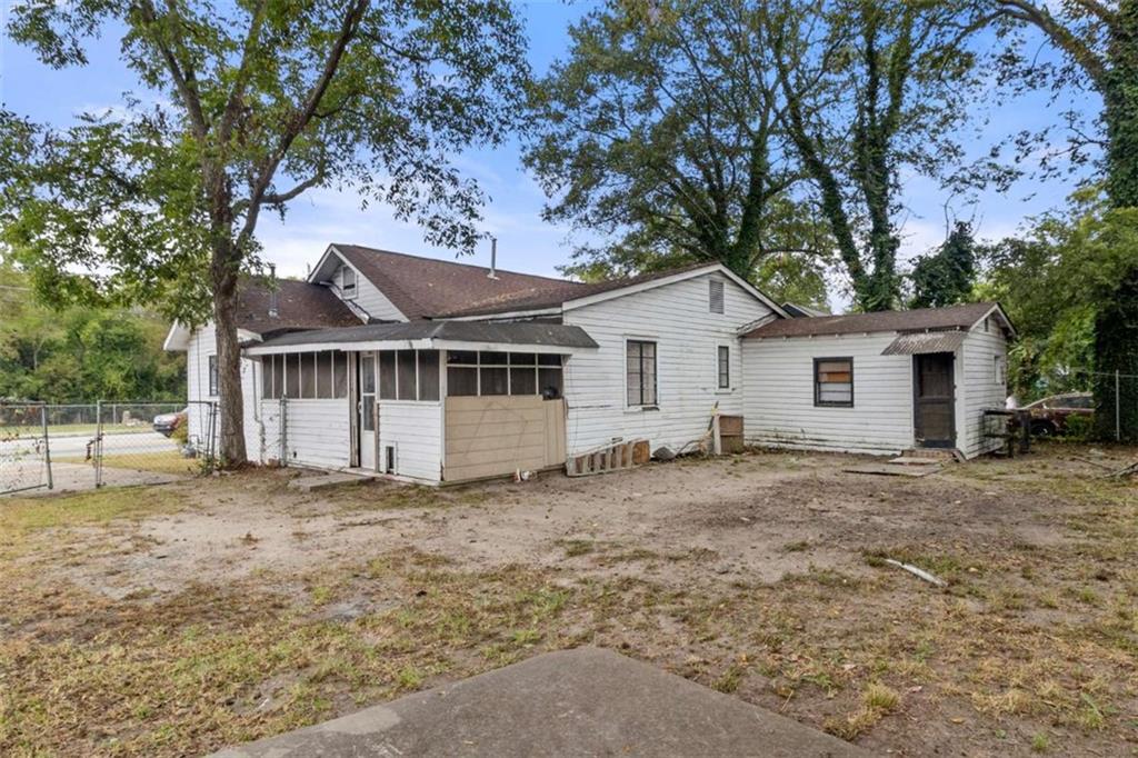 1638 Burton Avenue Macon, GA 31204 - Photo 2 of 15 a view of a house with a yard