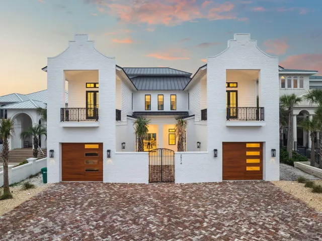 a living room with furniture a flat screen tv and a large window