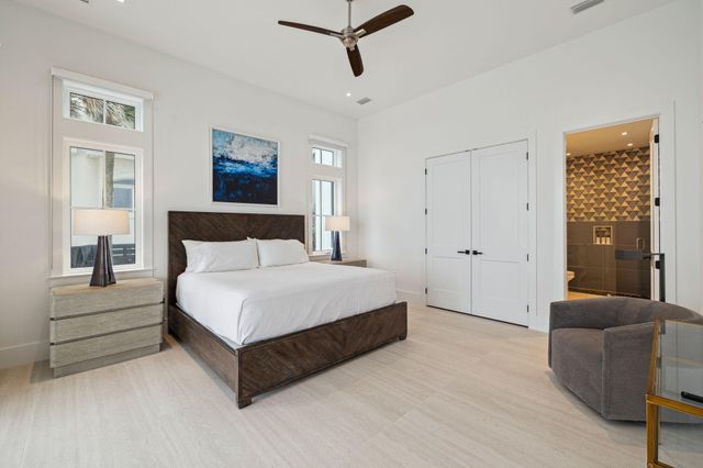 a utility room with sink dryer and washer