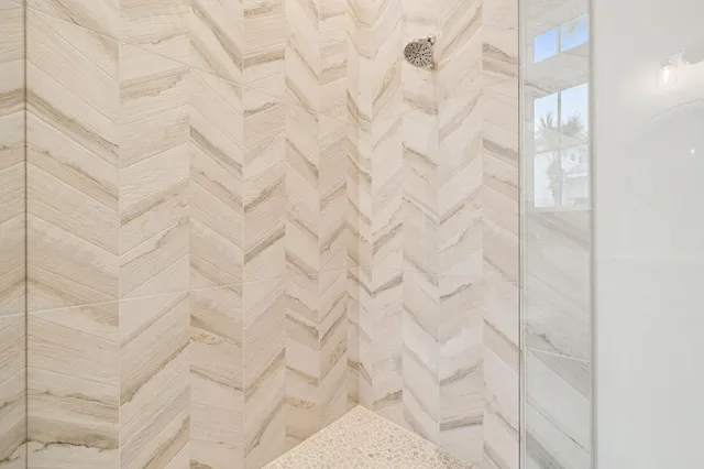 a living room with kitchen island furniture and a table