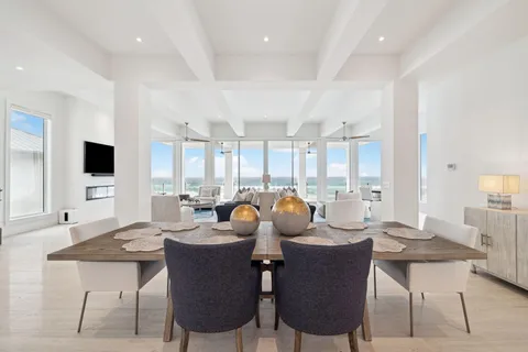 a front view of a building with a yard