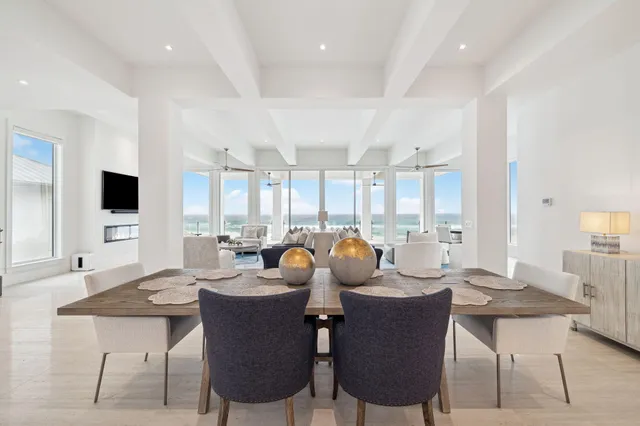 a front view of a building with a yard