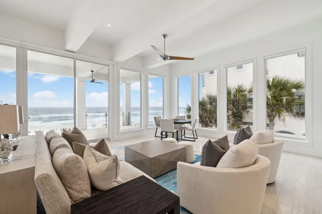 a spacious bathroom with a double vanity sink a mirror and a bathtub