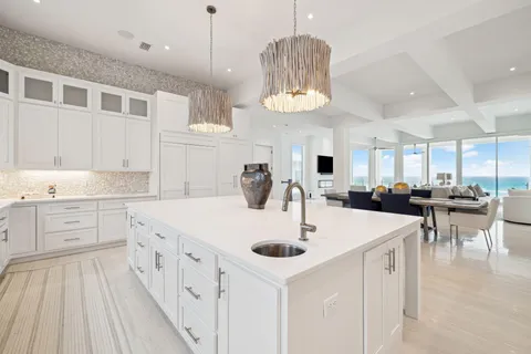 a kitchen with a sink and a microwave