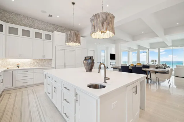 a kitchen with a sink and a microwave