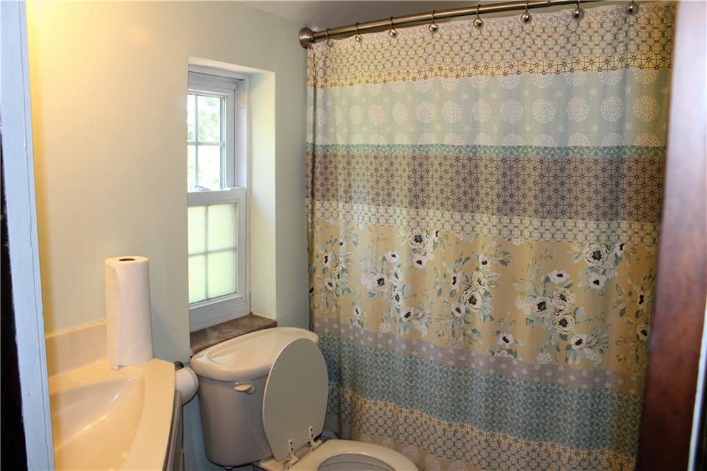 2023 Brookfield Road Pittsburgh, PA 15243 - Photo 13 of 21 a bathroom with a sink toilet and shower