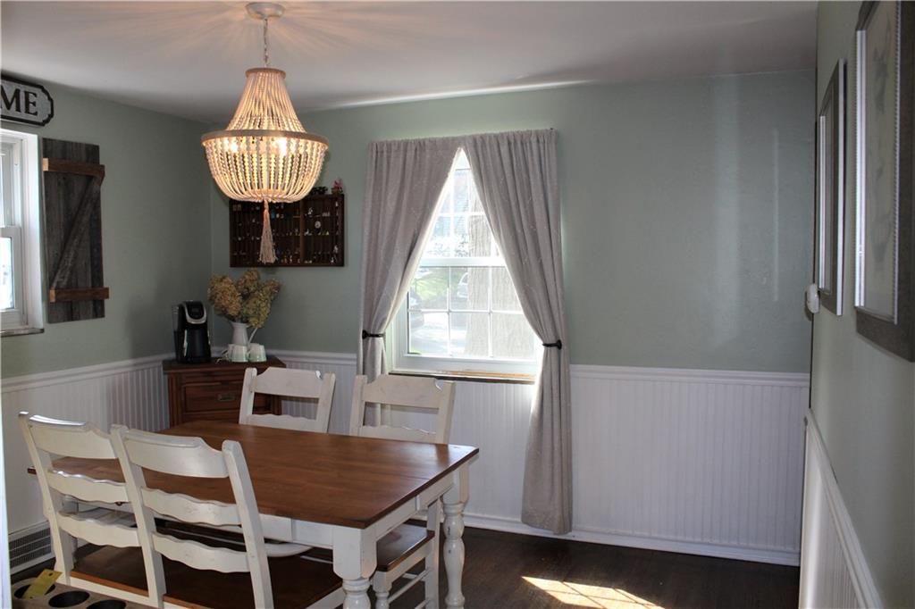 2023 Brookfield Road Pittsburgh, PA 15243 - Photo 3 of 21 a view of dining room and kitchen with a table chairs