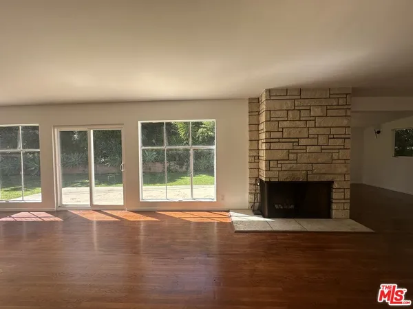 a view of gallery with wooden floor