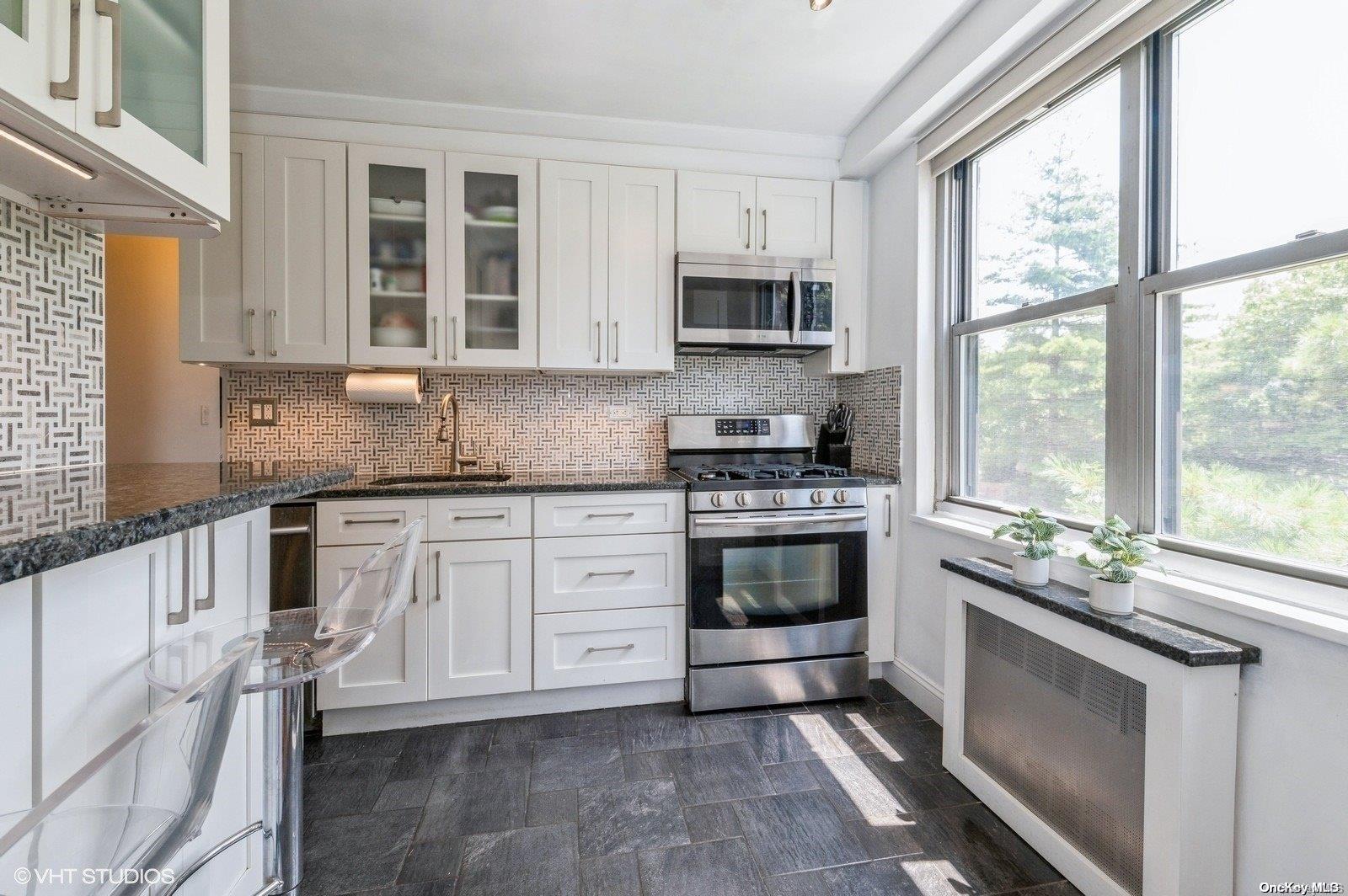 70-25 Yellowstone Boulevard, Unit 2T Queens, NY 11375 - Photo 9 of 13 Kitchen