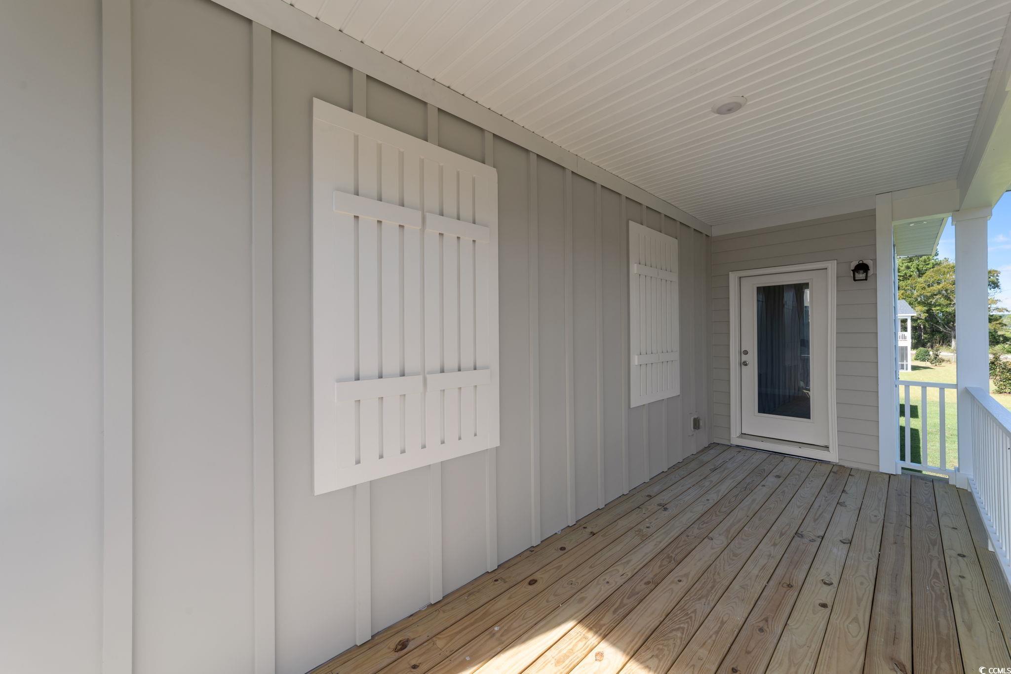 775 Ebb Tide Road Little River, SC 29566 - Photo 21 of 39 View of wooden terrace