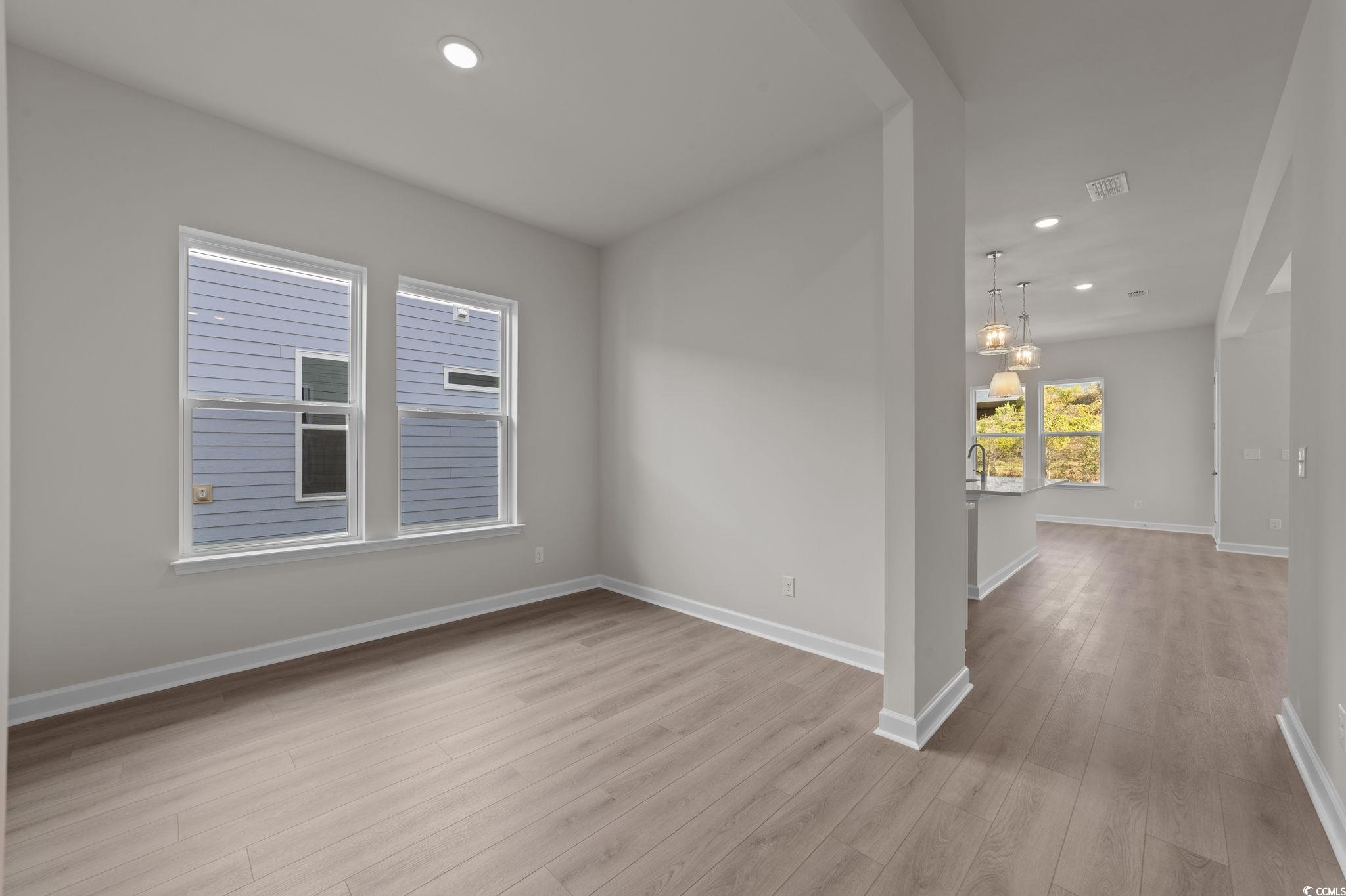 775 Ebb Tide Road Little River, SC 29566 - Photo 25 of 39 Spare room featuring recessed lighting and light wood-type flooring
