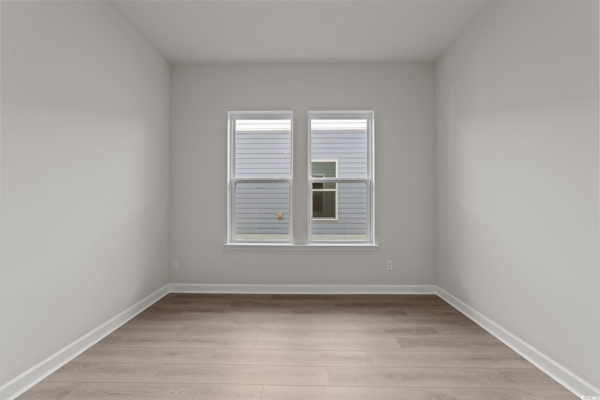 775 Ebb Tide Road Little River, SC 29566 - Photo 26 of 39 Unfurnished room with baseboards and light wood-style floors